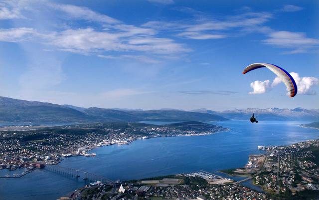 Paragliding over Tromsø. Possible to organise on occasion