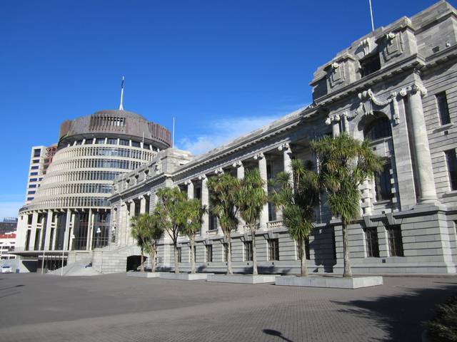 The Beehive (at left) and Parliament House