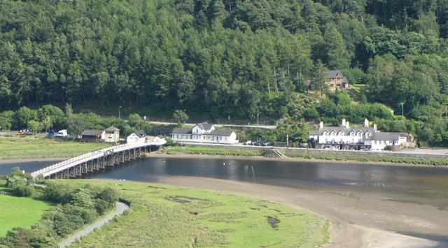 Penmaenpool toll bridge, old signal box and George III inn on the south bank of the Mawddach Estuary