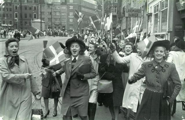 Danes celebrating the liberation of Denmark from the occupation of Nazi Germany during World War II on 5 May 1945 in the streets.