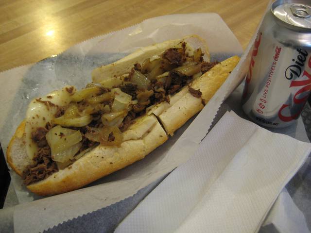 Cheesesteak at Jim's Steak with Provolone cheese and onions