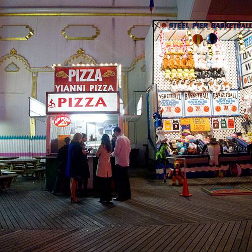 A pizza vendor on the boardwalk