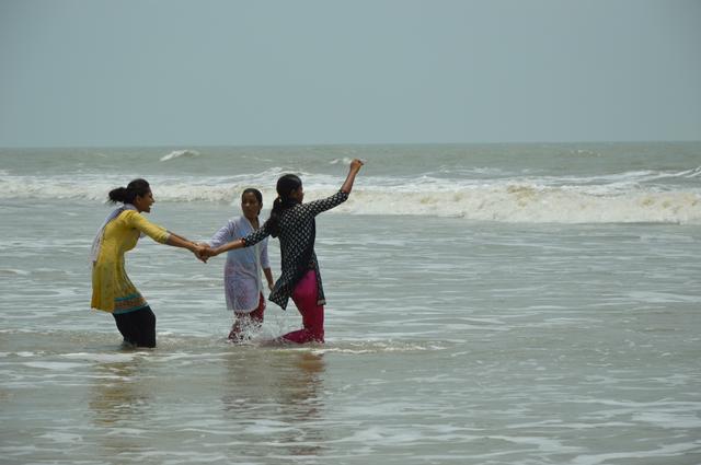 Playful Girls with Sea Waves, Shankarpur Beach.