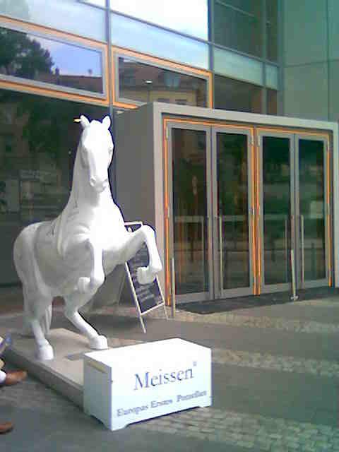 A horse made of porcelain outside the porcelain museum