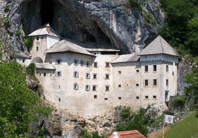 Predjama Castle emerging from its cave