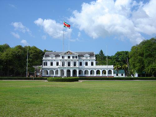 Once a symbol of Dutch colonial power, the monumental former Governor's mansion on Independence Square now serves as the Presidential Palace of Suriname