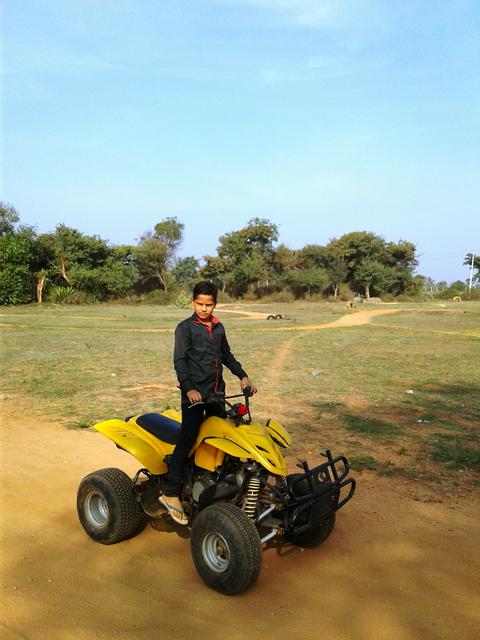 This boy rents Quad Bikes at the Gumbaz