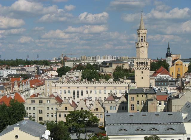 Town Hall of Opole peeking from behind the Old Town buildings