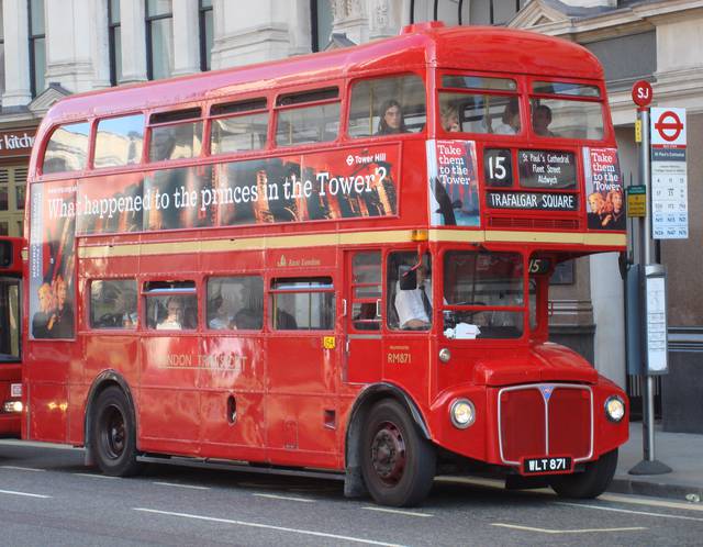 Double-decker Routemaster bus at a stop outside St Paul's Cathedral