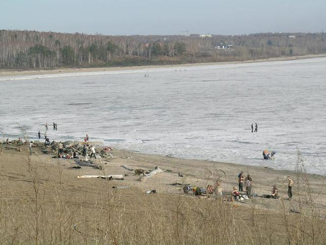 Tanning at the beach in spring