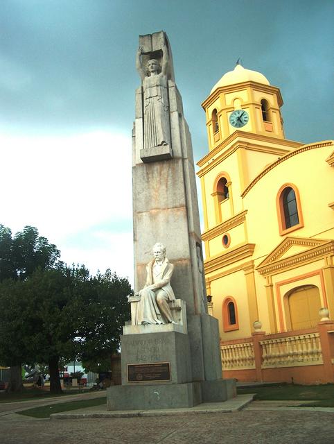 Monument to Salvador Brau in front of the San Miguel Arcángel Roman Catholic church (1783), Cabo Rojo, Puerto Rico