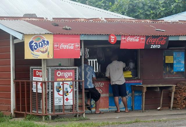 Kiosk advertising some of the world's most famous soft drink brands