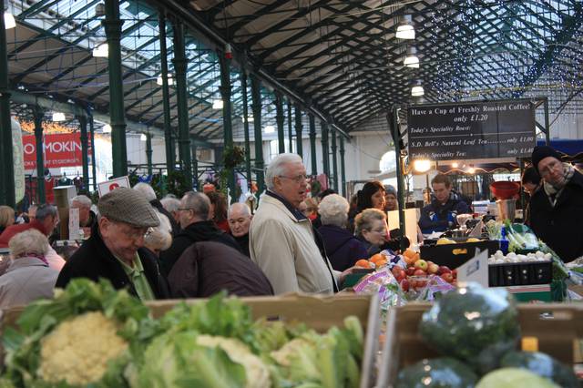 Traders and shoppers at St. George's Market