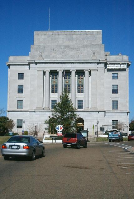 State Line Avenue circles around the Texarkana Post Office and Courthouse. This building is bisected by the Texas-Arkansas border.