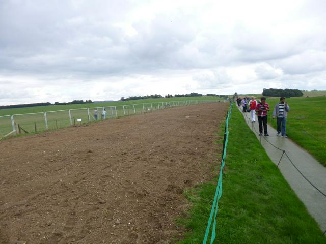 On the north side, the former roadway separates the public access land (left) from the paying visitors (right). The monument is just off-camera to the right, and can be clearly seen from the access land.