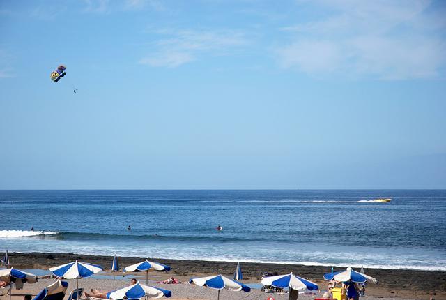 Parasailing and sunbathing