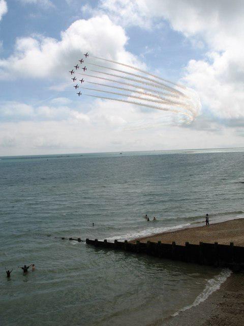 The Red Arrows flying over the beach during Airbourne