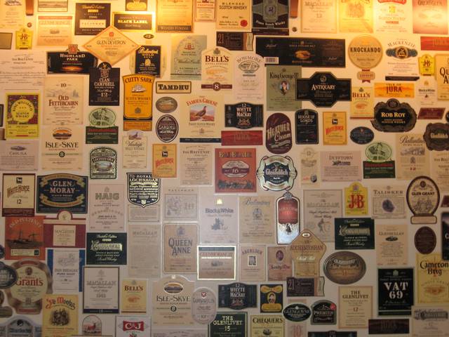 Part of the wall in the lounge of the Scotch Whisky Experience