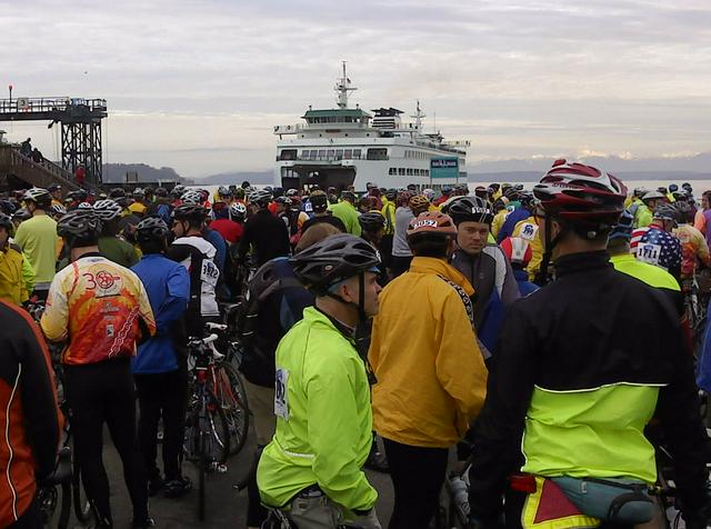 thousands of bicyclists take over the ferry to participate in the Chilly Hilly