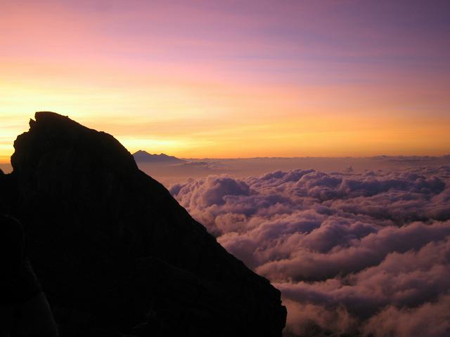 Sunrise from the summit of Mount Agung with Mount Rinjani (Lombok) in the background