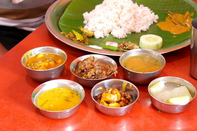 Manipuri lunch means white rice, vegetable curry, cucumbers, groundnut gravy and onions. 