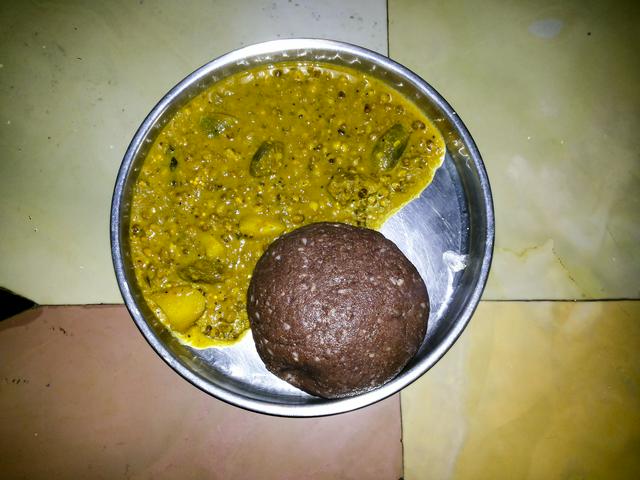 Balls of red finger millet are eaten in Chikmagalur with a curry of pulses