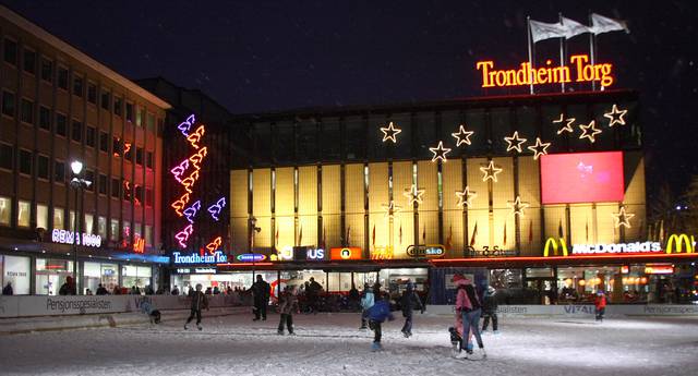 Trondheim Torg in the winter next to the central square which here has been turned into a skating rink