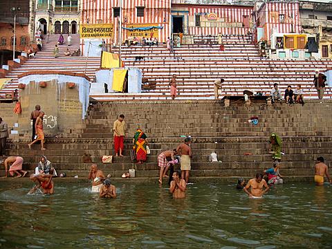 Hindu pilgrims bathing in the Ganges at Varanasi