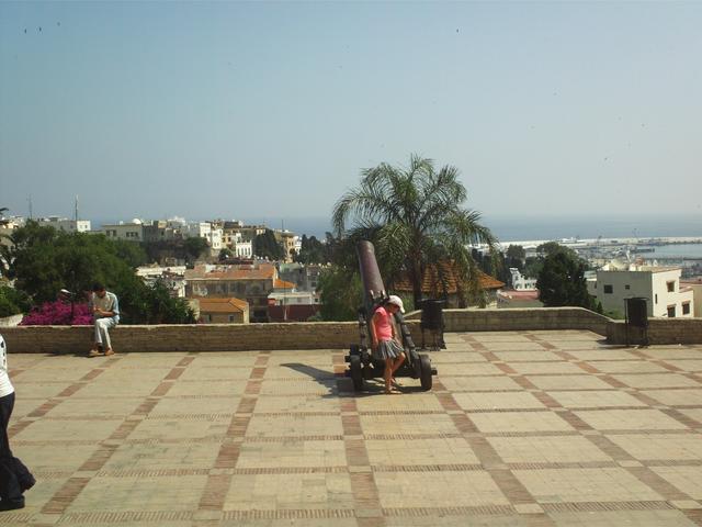View of Tangier, with the Spanish coastline in the background (blurred by haze)