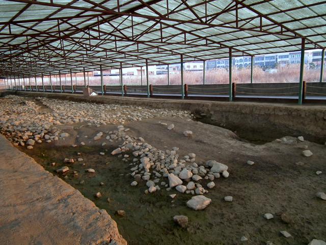 The remains of the western city wall of Liangzhu